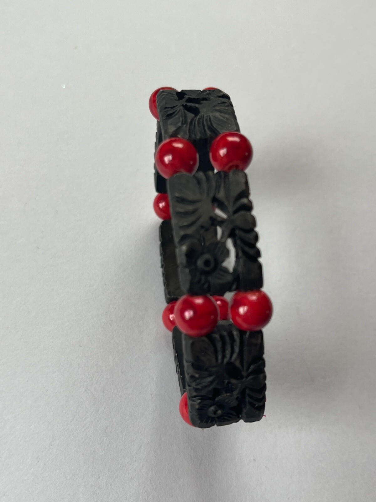 Alternating Carved Black Floral Rectangle & Red Round Plastic Beads Stretch Brac