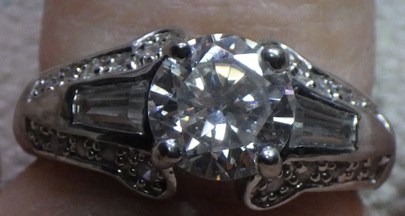 colorful crystal stone ring silver color ring says RSC925 coating only size 10