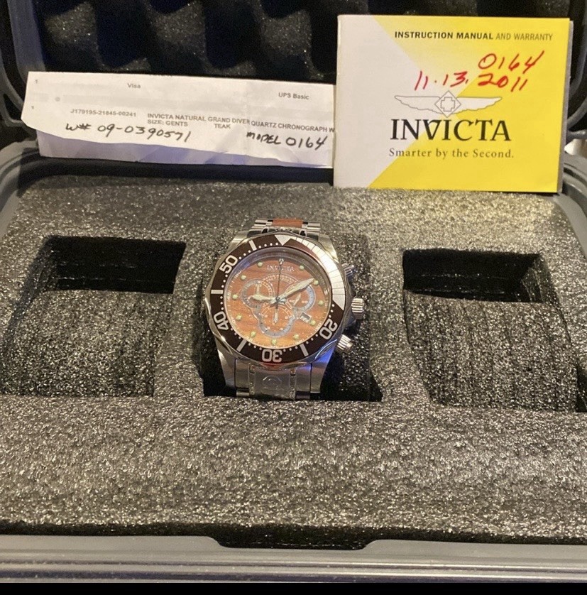 Invicta Pro Diver men’s quartz watch with a wood grain dial model 0164.