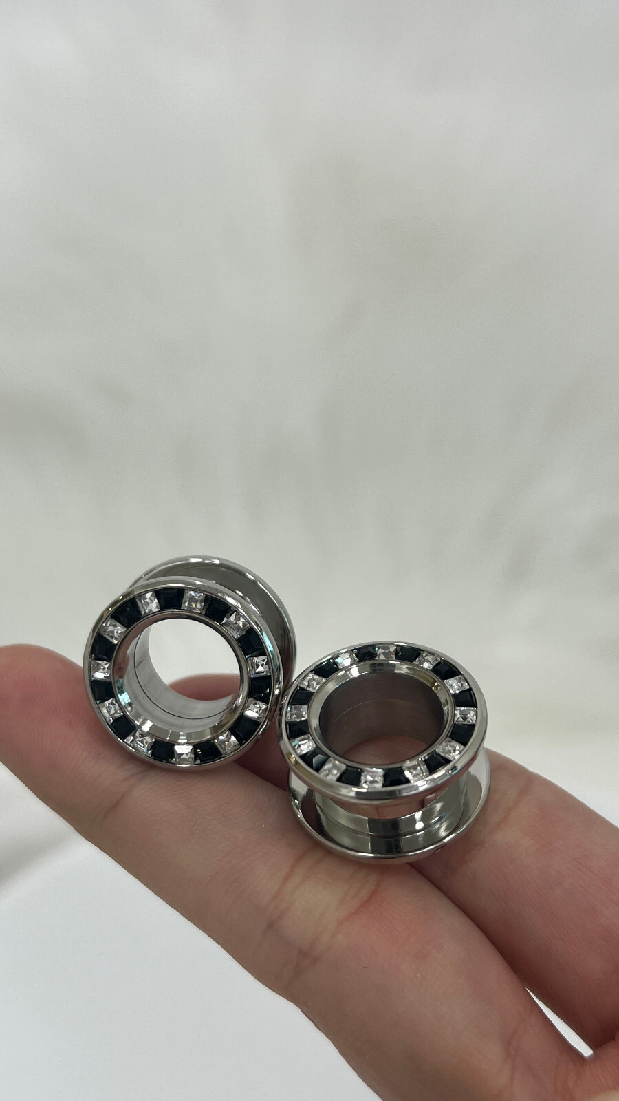 Pressed Rimmed Surgical Steel Black Clear CZ Screw Tunnel Ear Plugs – Sold Pair
