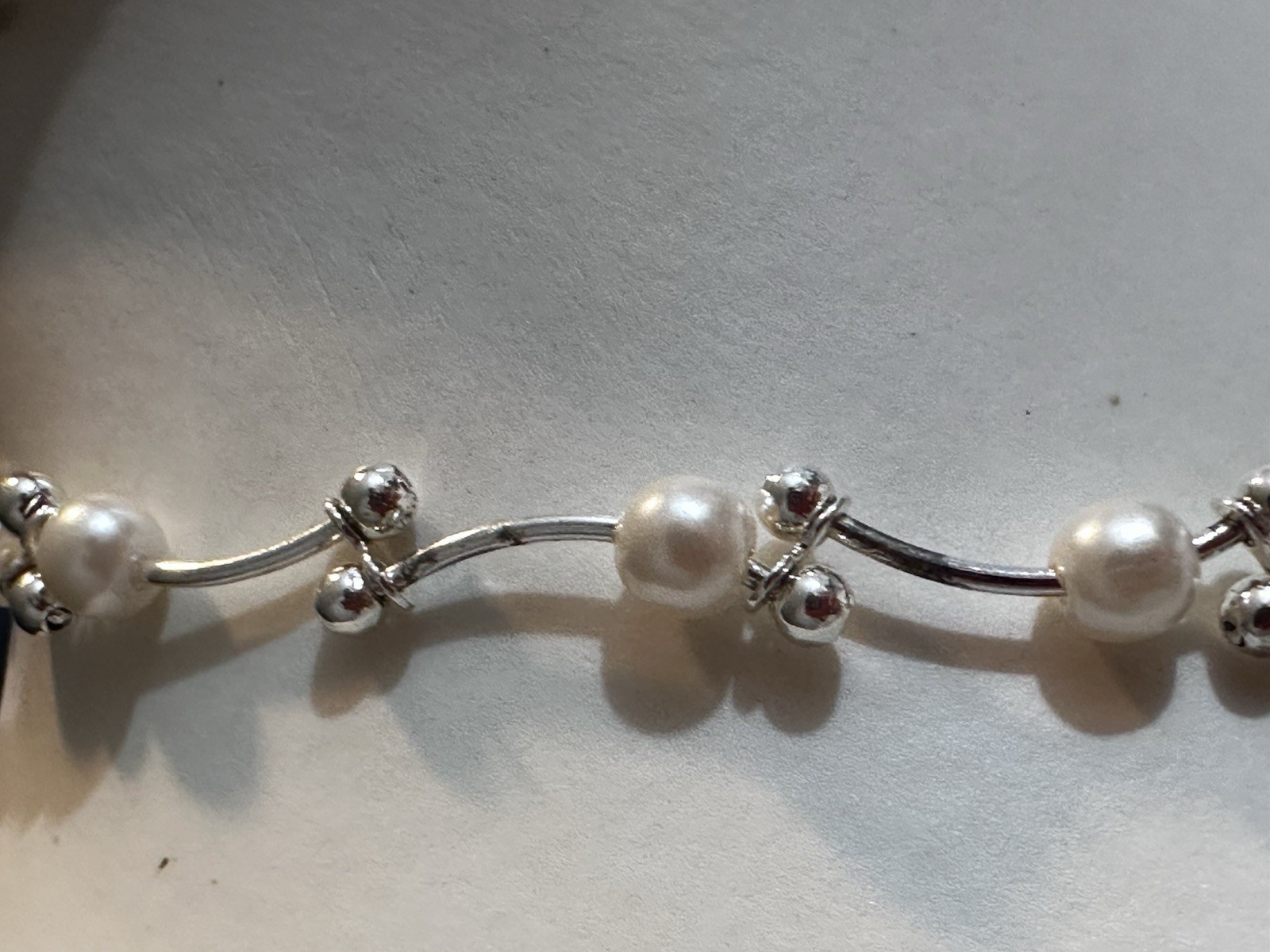 Elegant Twisted Faux Pearl Necklace with Silver-Tone Finish