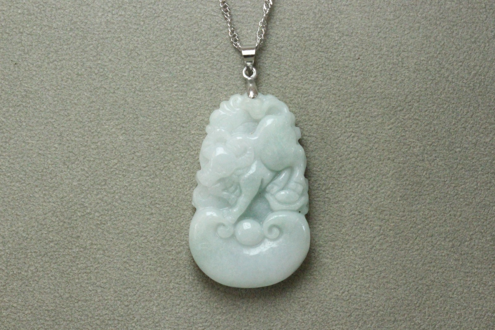 Natural White green A Jadeite jade Hand-Carved Cow (Chinese Zodiac) Pendant