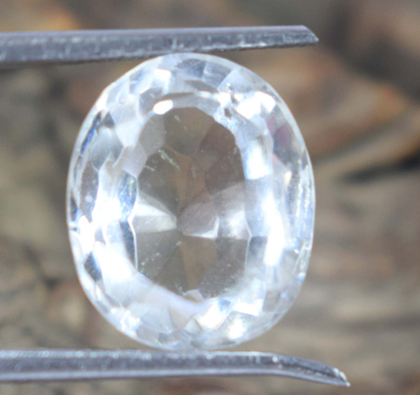 White Montana Sapphire 9.05 Ct/12 mm Natural Oval Gemstone Certified B97819