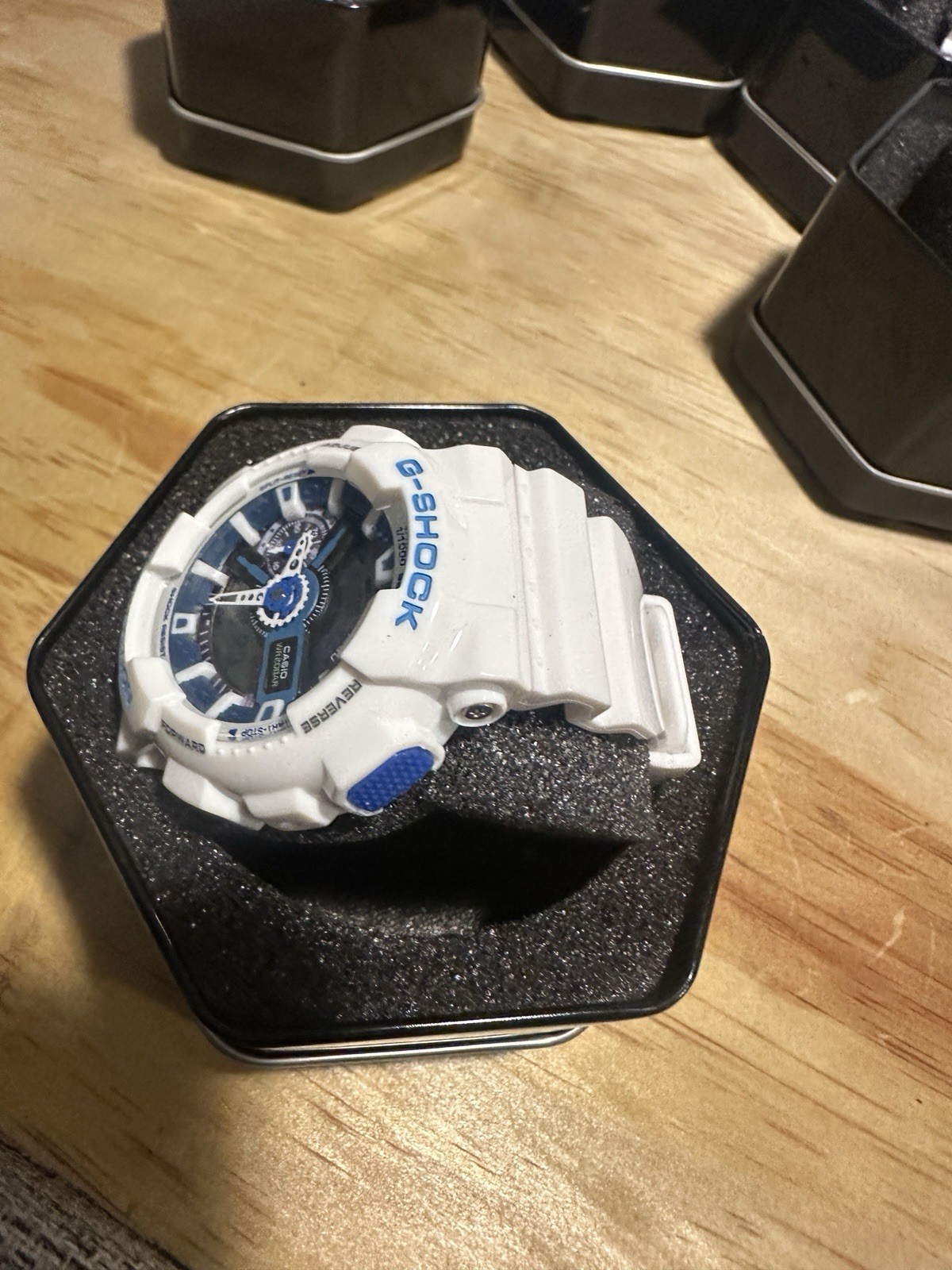 Casio Men’s G Shock GA-110 Analog-Digital Watch White and Blue Resin Dial