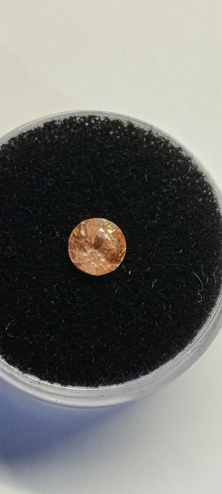 peach schiller faceted Oregon Sunstone 0.80 carat 5.4mm round found & cut in USA