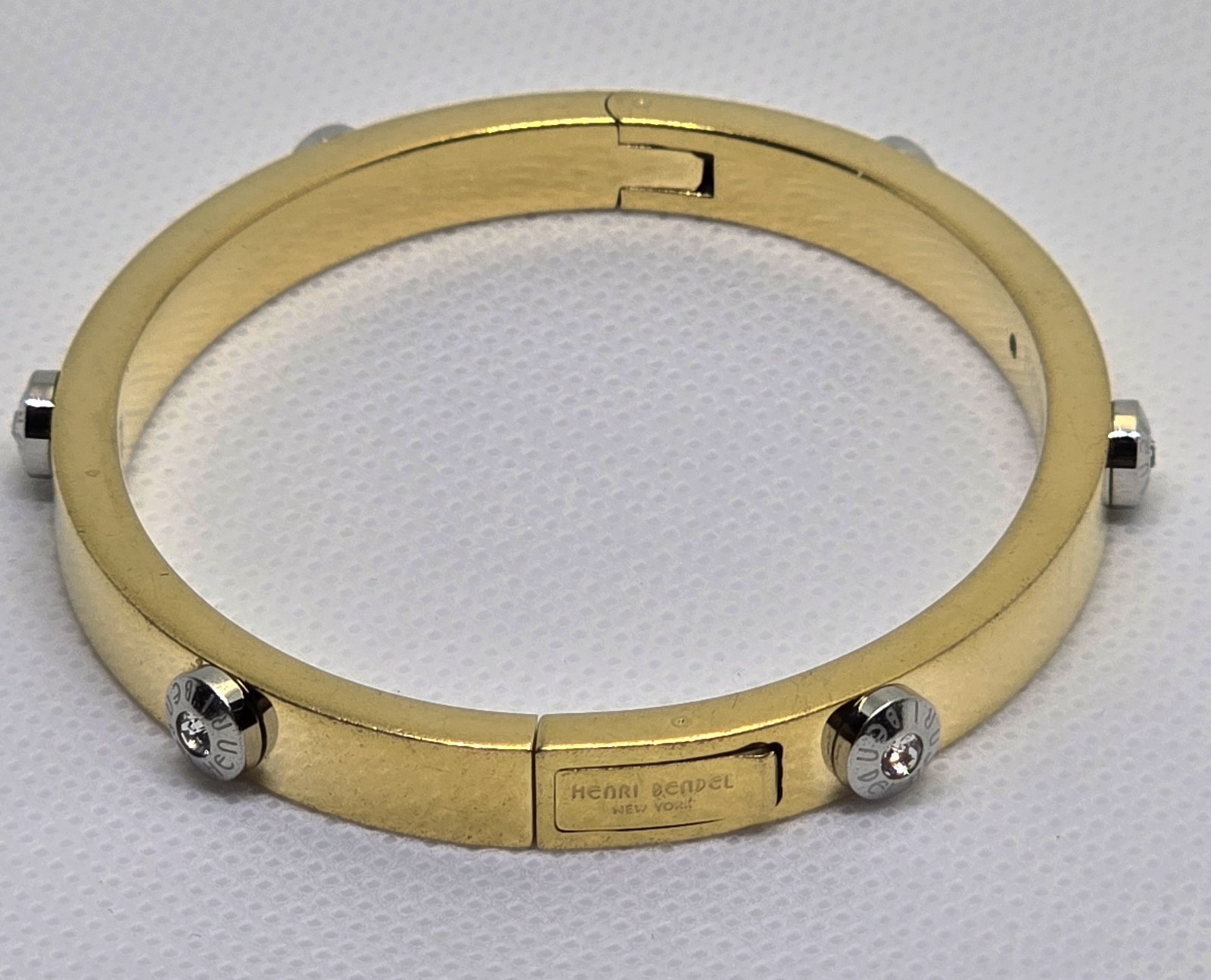 HENRI BENDEL New York Gold Tone Crystal Screw Hinged Bangle Bracelet Signed