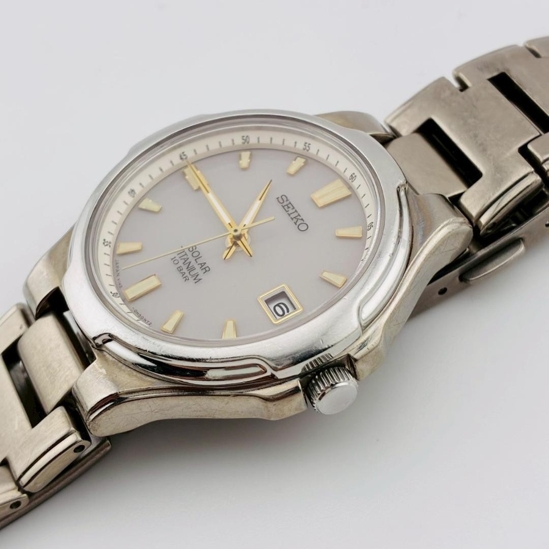SEIKO Men’s Watch, Date Display, Original Strap, Solar Powered, Titanium