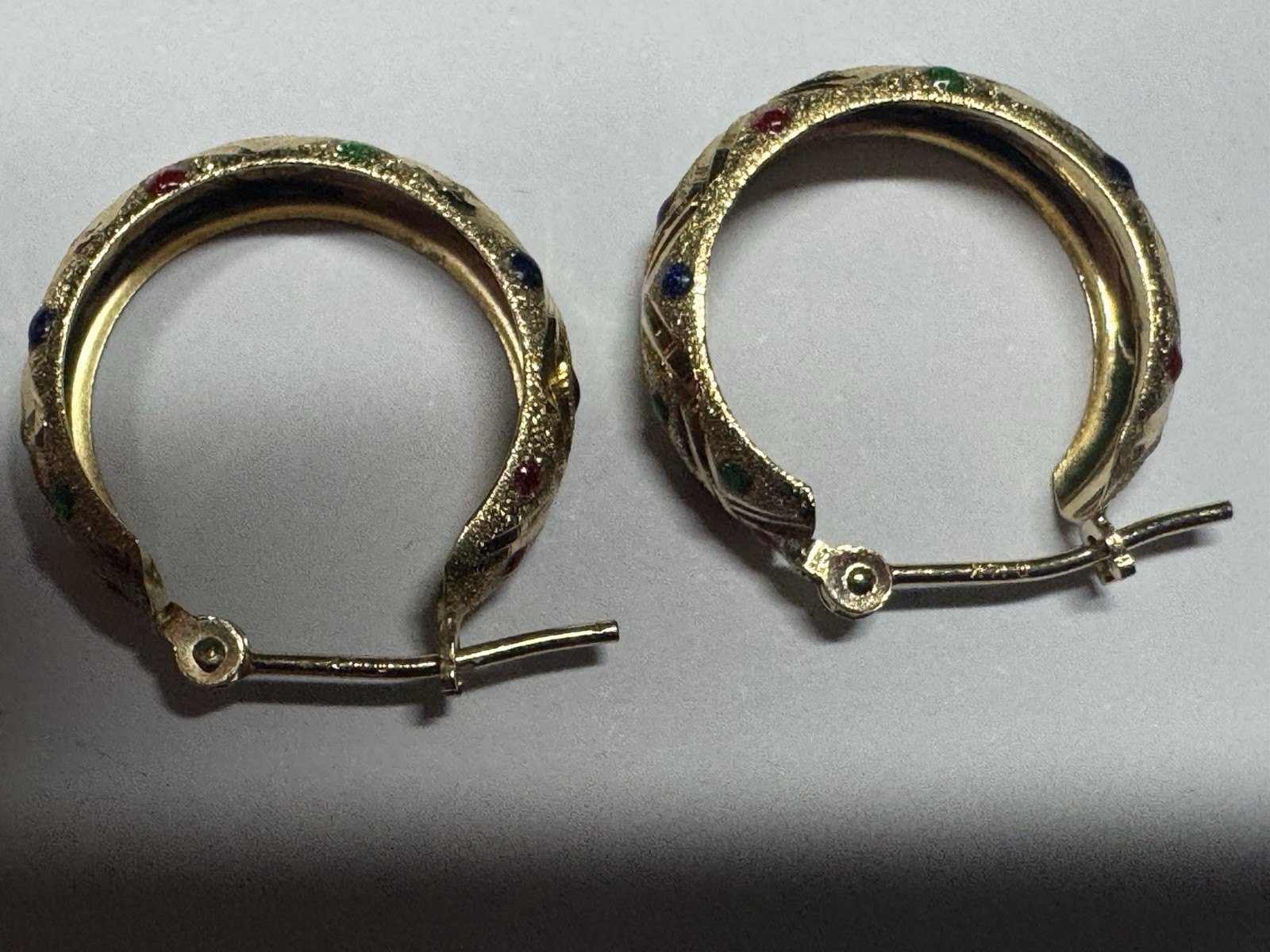 14K Yellow Gold Huggie Earrings with Gemstones dotted all around .9g