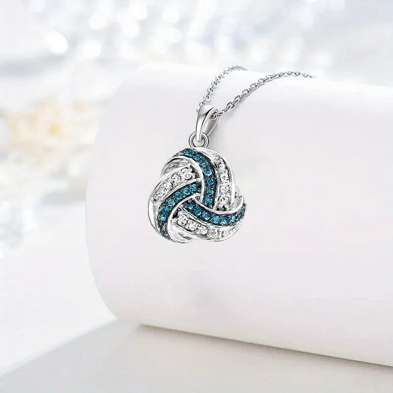 Sterling Silver Love Knot Pendant Necklace with Blue & White Sapphires