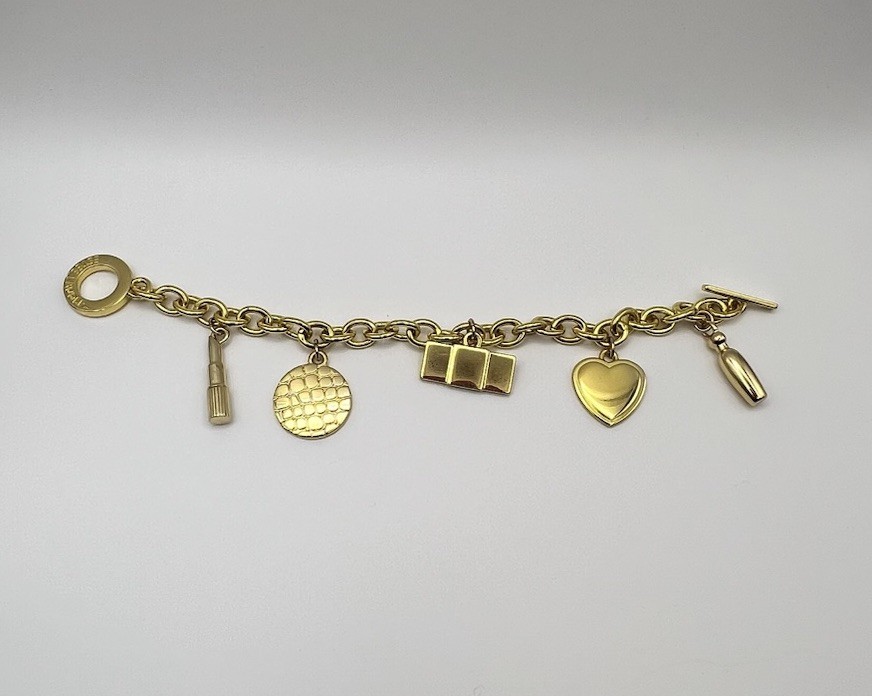 Vintage ESTEE LAUDER Runway Gold Tone Charm Bracelet Couture 7.5 ”