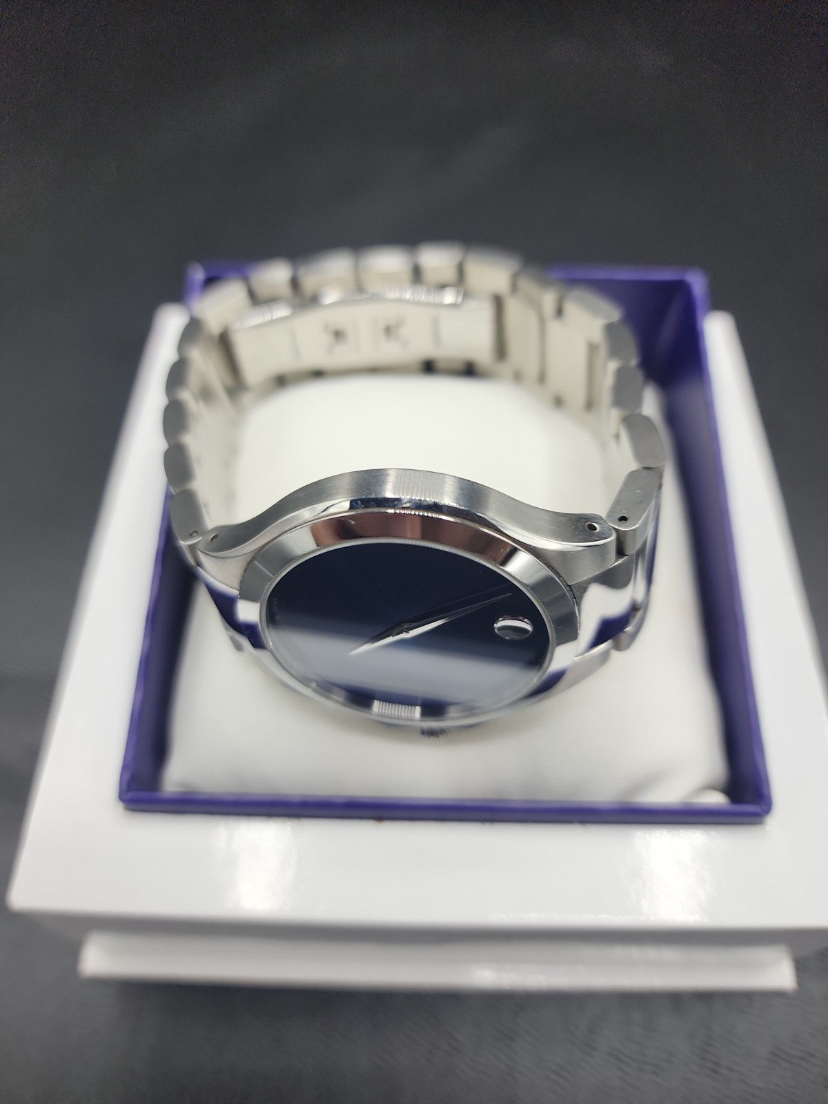 Movado Stainless Steel Defio Men’s Blue Museum Dial Dress Watch new battery