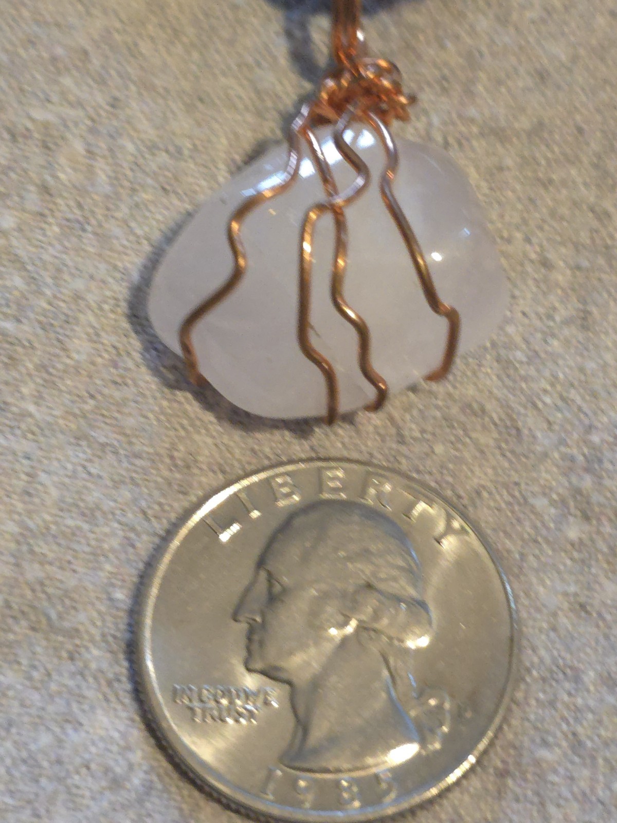 White Quartz Pendant On A Brown Leather Necklace