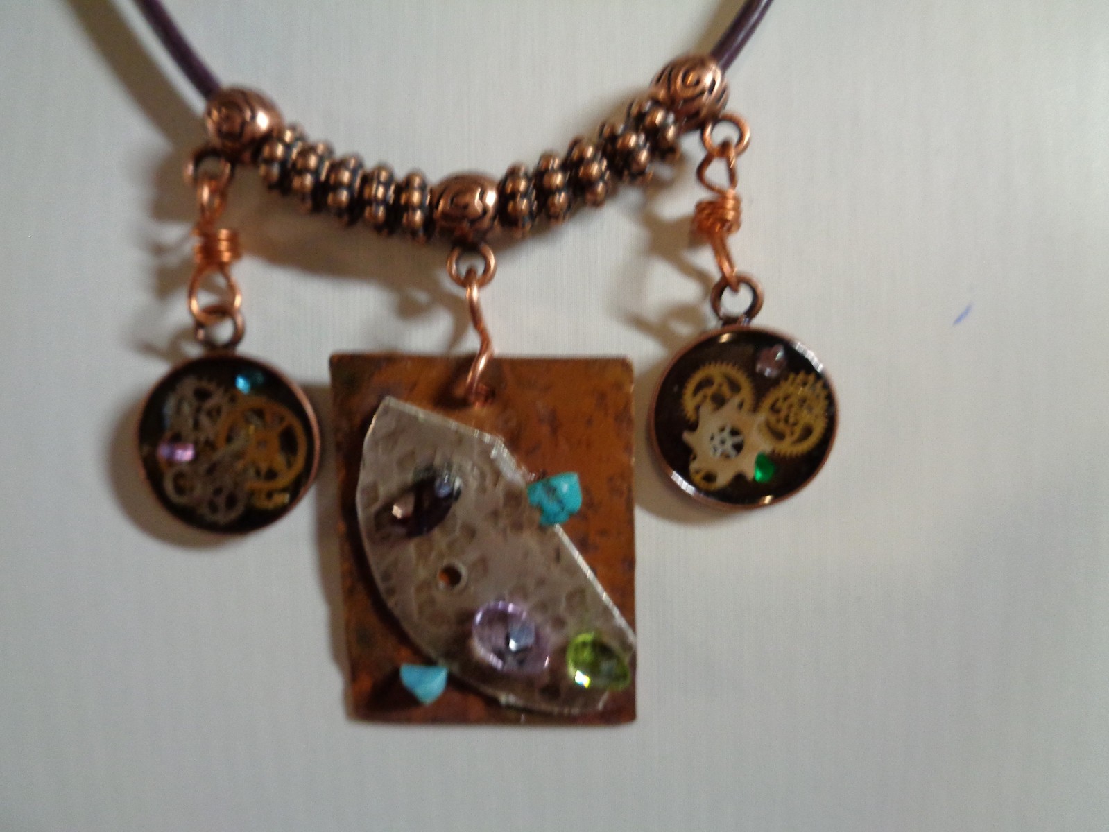 Artisan crafted,eclectic,18” necklace. Central handcrafted copper collage pendan