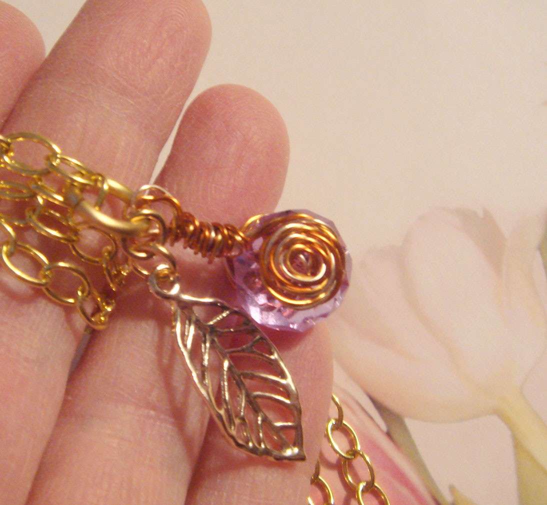 #191 Large Crystal Lavendar Pendant with Gold Chain 24″ Wire Wrapped