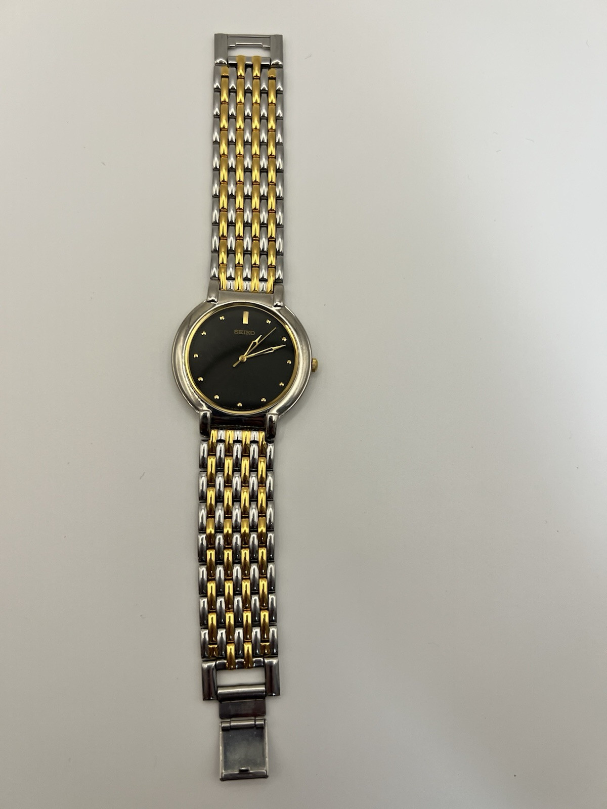 Black And Gold Dial Seiko Watch With Two Tone Bracelet Band (Running)