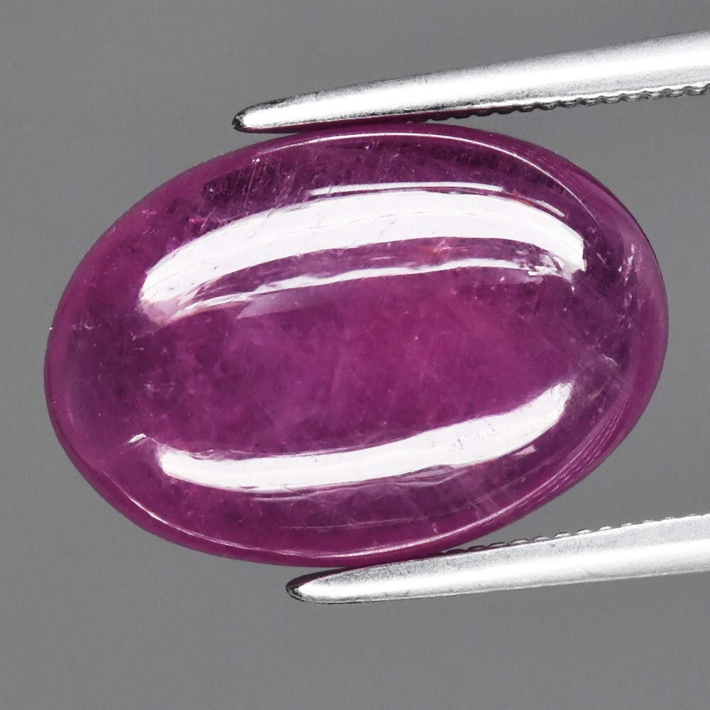 7.69ct Oval Cabochon Pinkish Purple Sapphire Gemstone (Heated Glass Filling)