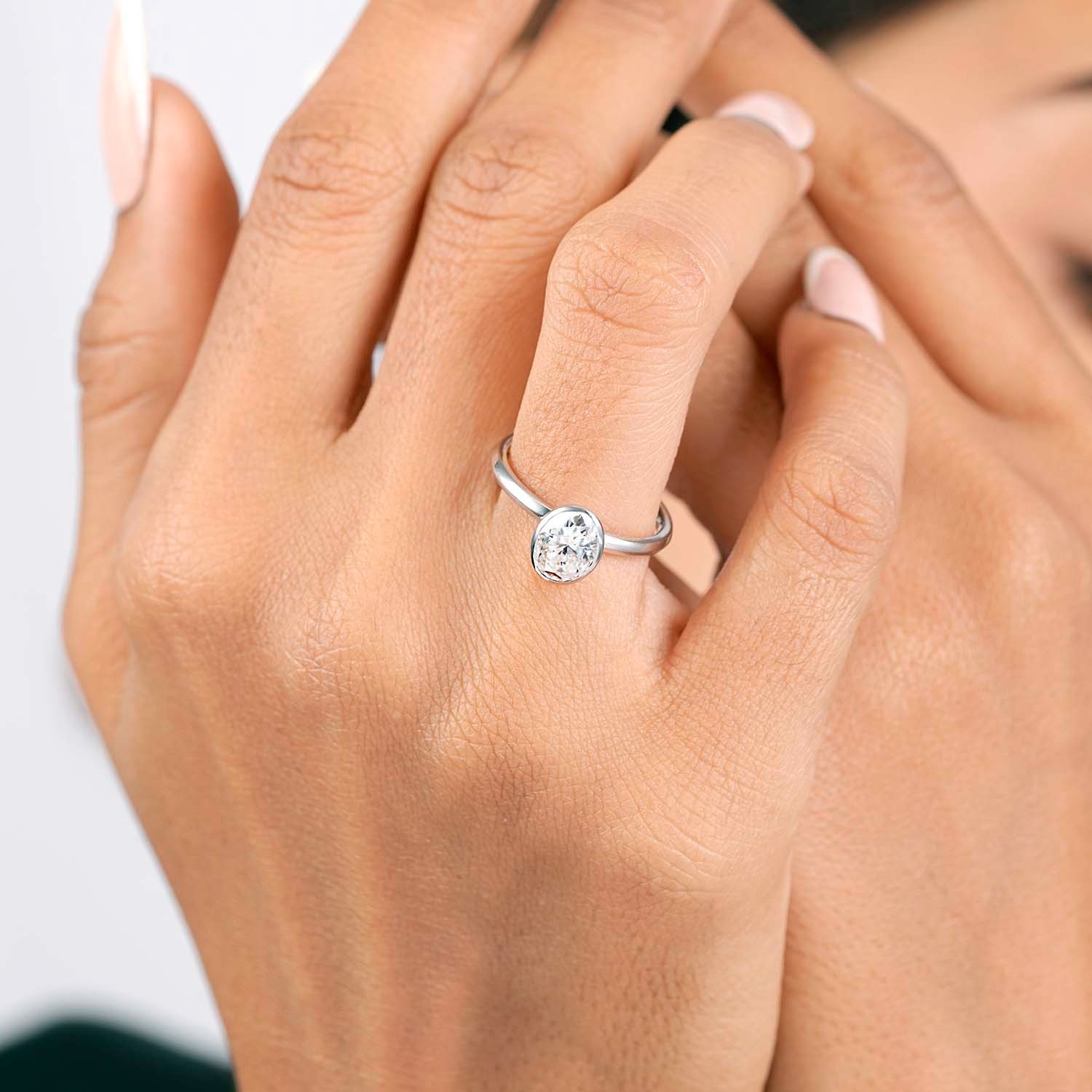 1.50 Ct Oval Lab Grown Diamond Solitaire Bezel Engagement Ring 18K Yellow Gold