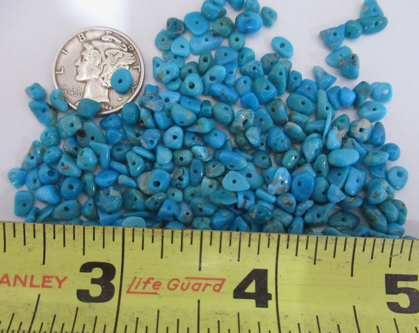 SLEEPING BEAUTY TURQUOISE 1/2 OZ SMALL DRILLED NUGGETS 4X3mm TO 7X4mm #642