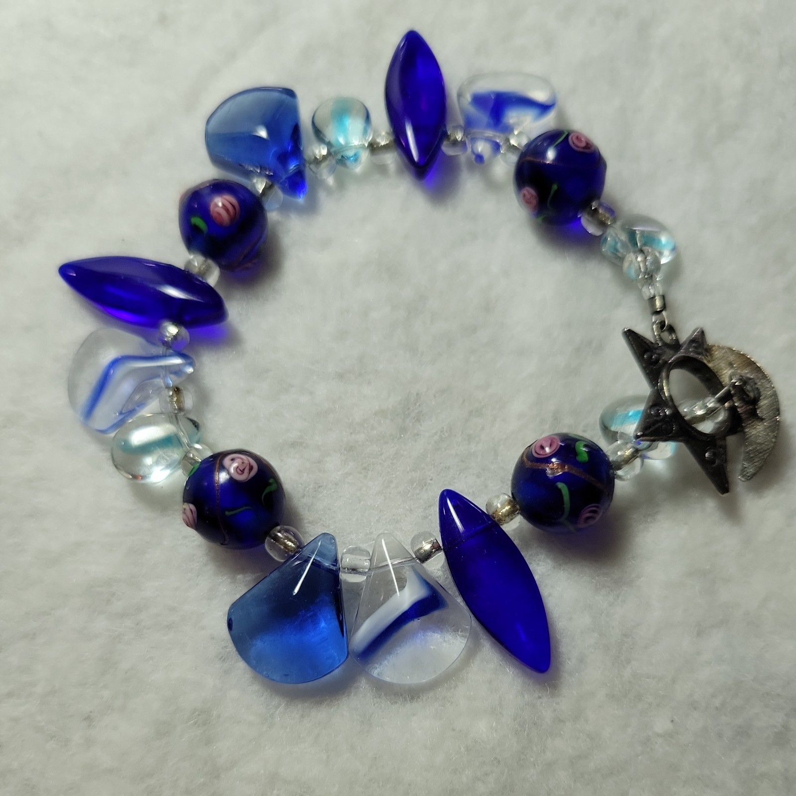 Artisan Beaded Bracelet Shades of Blue And Clear Glass Beads About 8 Inches Long