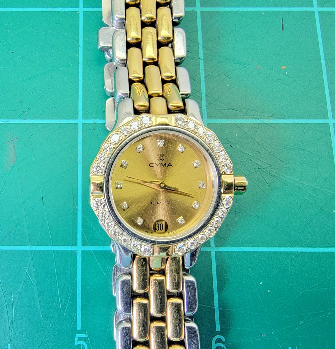 CYMA 18K Gold Diamond Bezel, Gold Band Tops Swiss Quartz Ladies Wristwatch