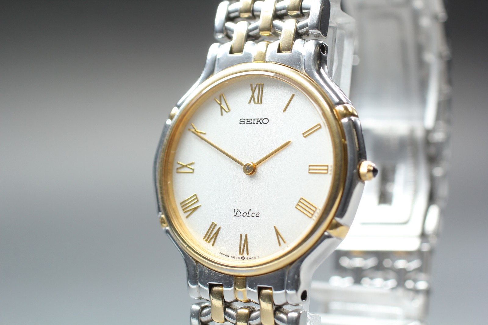 Vtg 1988 N MINT Seiko Dolce 5E30-6A00 Quartz Two-Tone Roman HAQ Mens Watch JAPAN