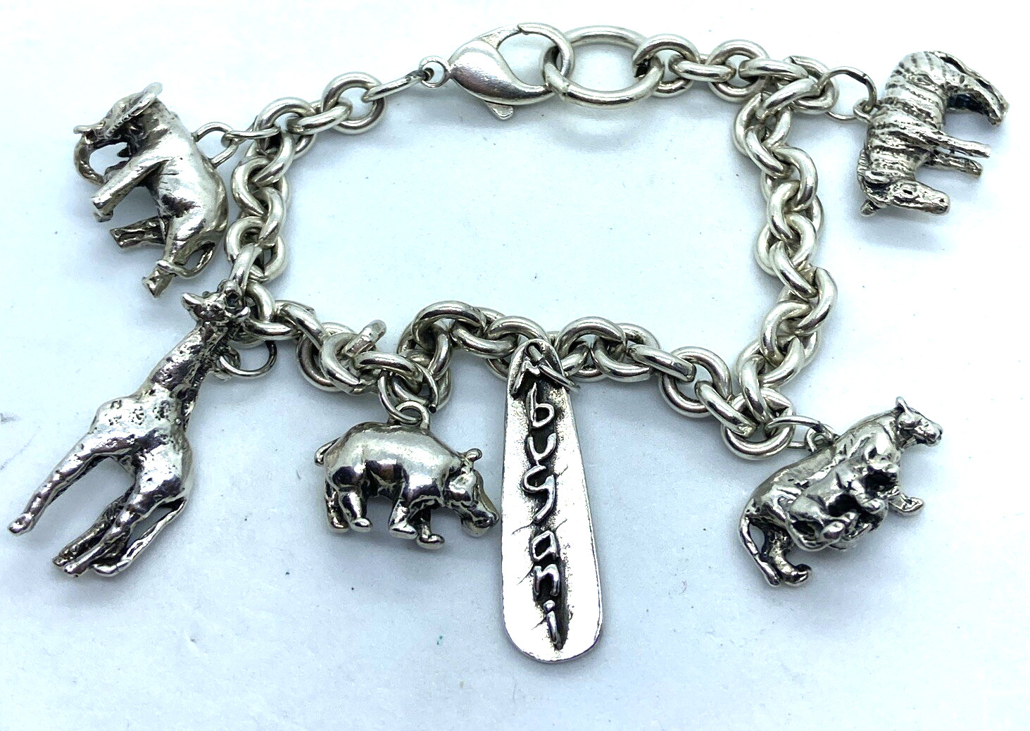 RARE SUSAN CUMMINGS STERLING SILVER (5) AFRICAN ANIMALS MBUGANI CHARM BRACELET