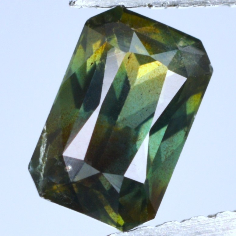 1.33Ct AIG Certified Untreated Unheated Natural Yellowish Green Ceylon Sapphire.