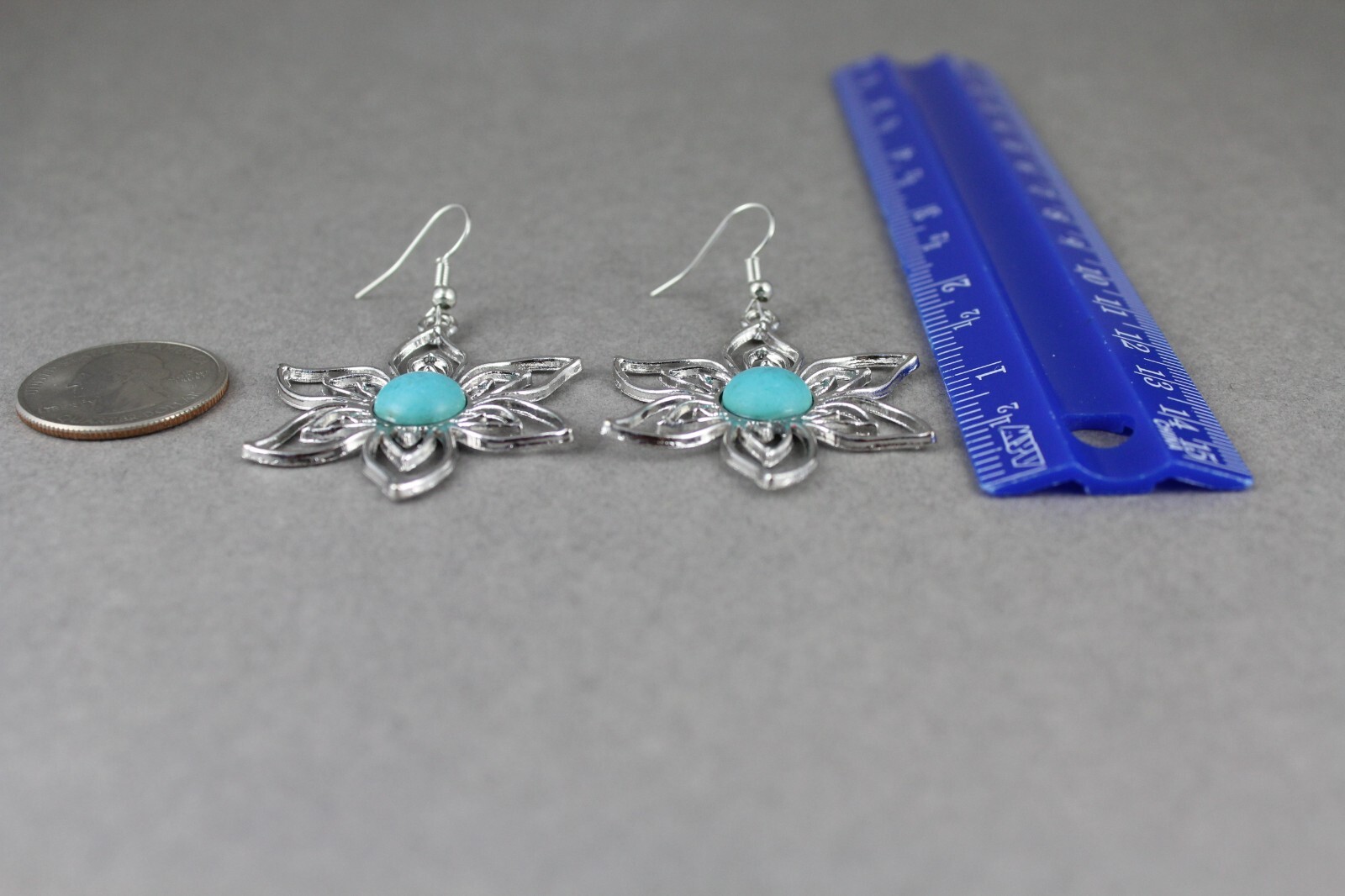 turquoise silver earrings lightweight flower outline dangle 2 3/8 long stamped