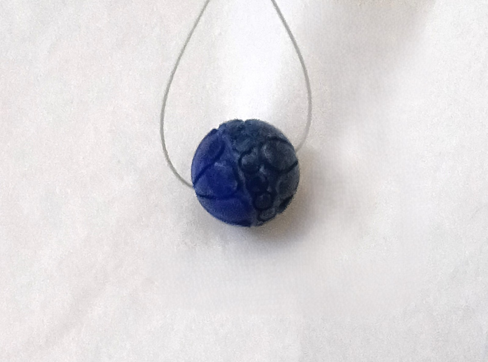 ONE (1) CARVED LAPIS LAZULI 15MM ROUND BEAD – 0534