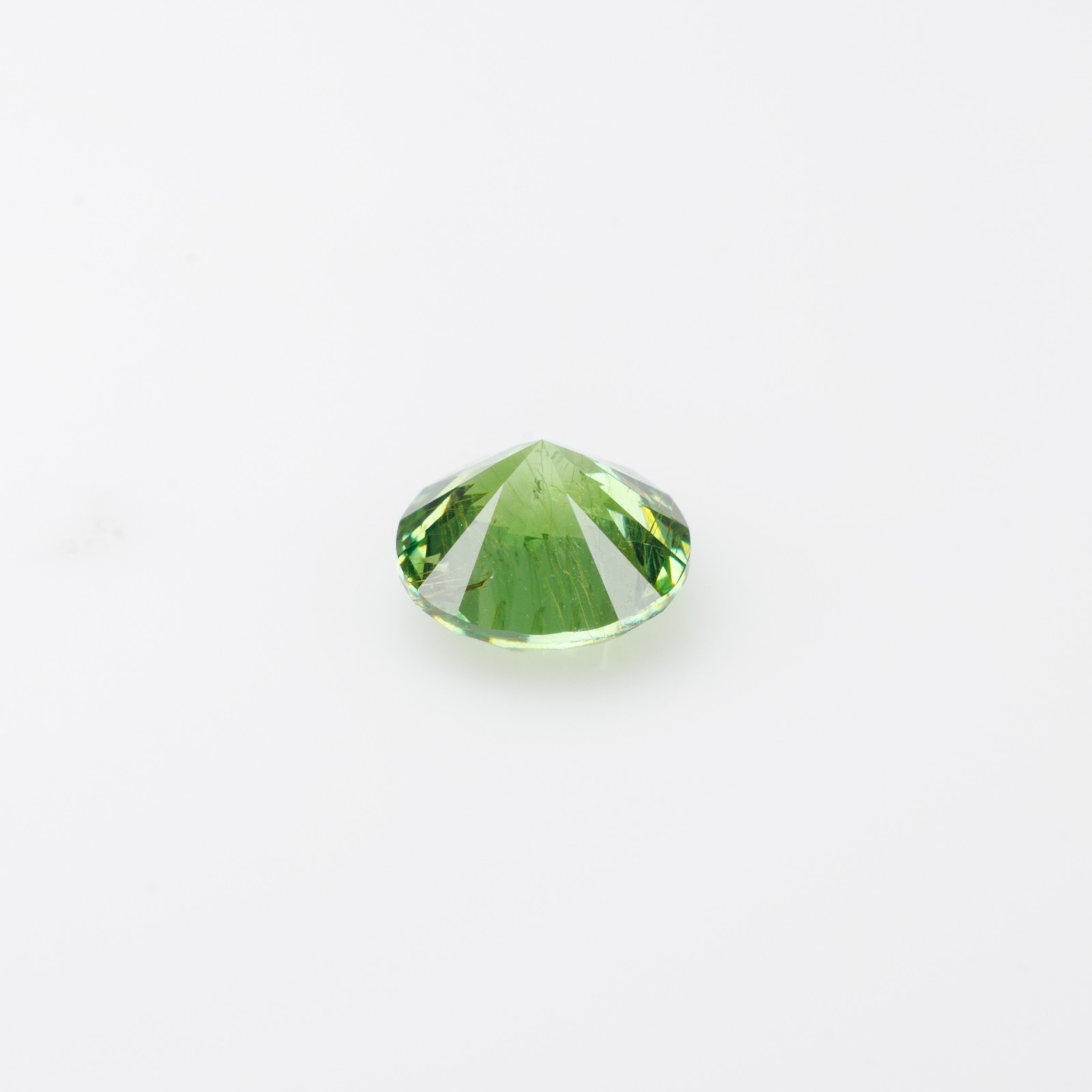 0.57 ct, Faceted Russian demantoid garnet