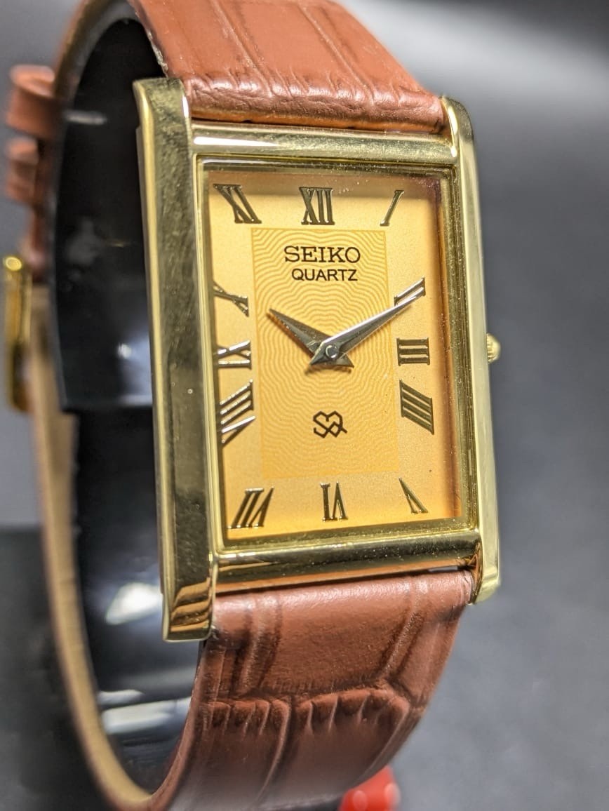 Seiko Quartz Rectangular Green Dial Black Band Roman Numerals Men’s Watch