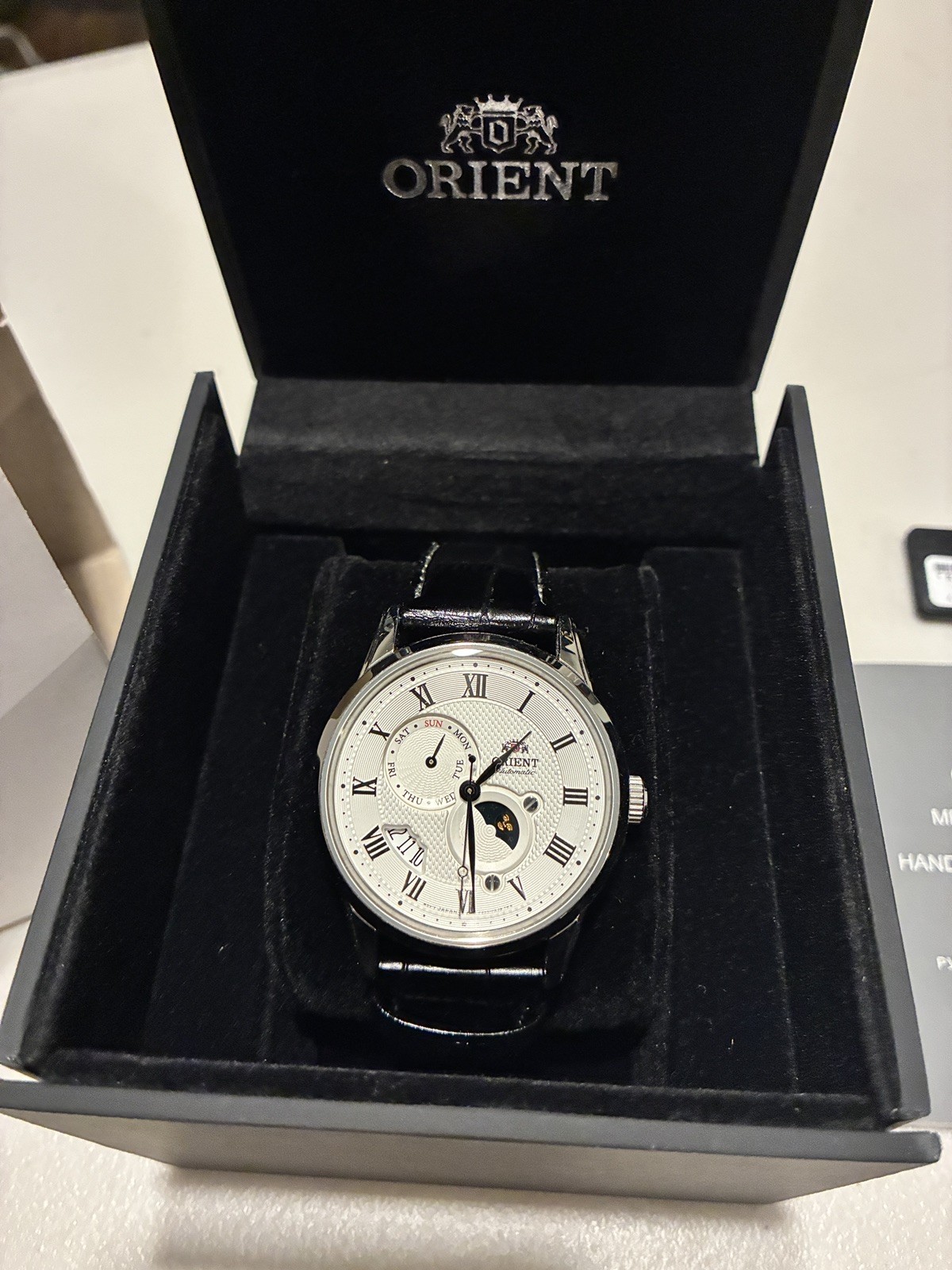 Orient Men’s Sun And Moon Automatic Watch Silver Stainless Case Black Leather