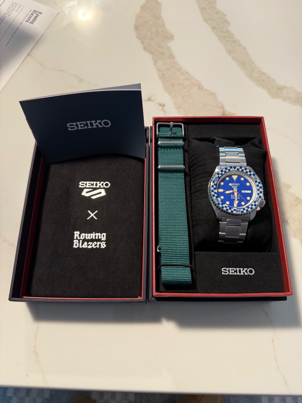 Seiko x Rowing Blazers Limited Edition Auto Blue Dial Day/Date + Strap Box