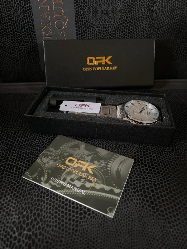 Classic Luxury Silver Quartz Watch with Blue Accents