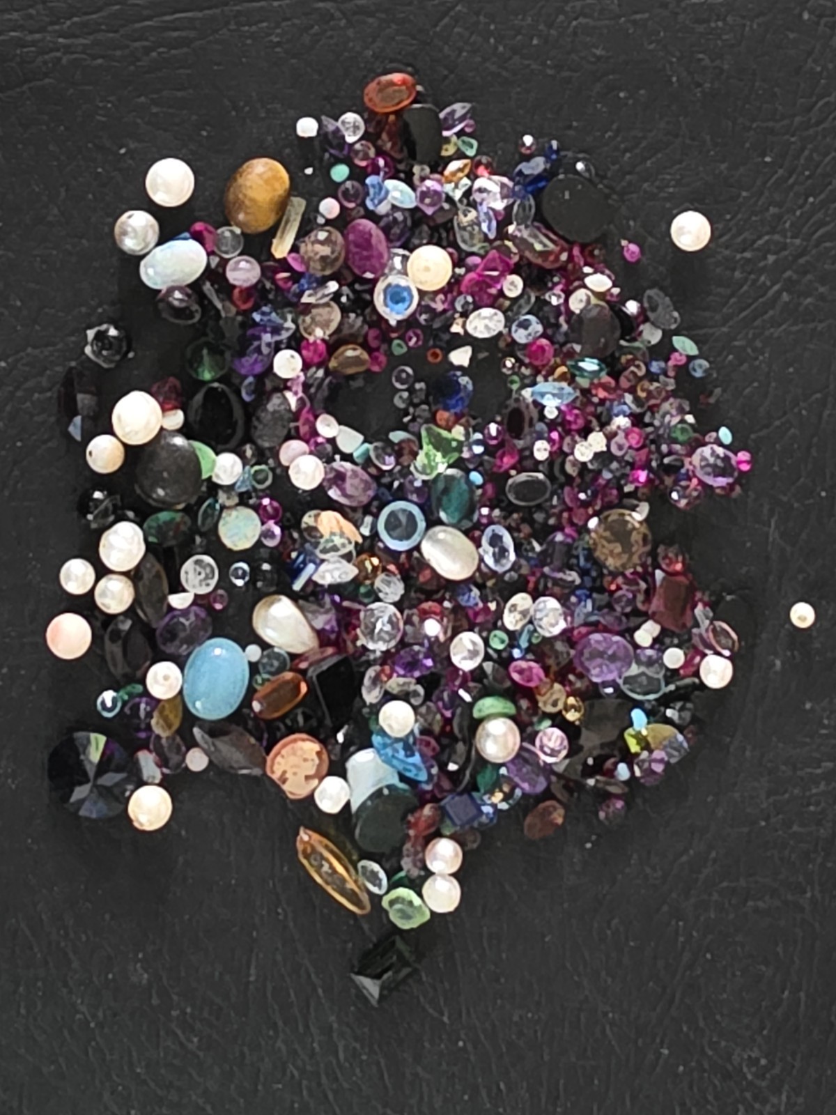 205 Ct Mixed Lot of Natural and synthetic Gemstones .