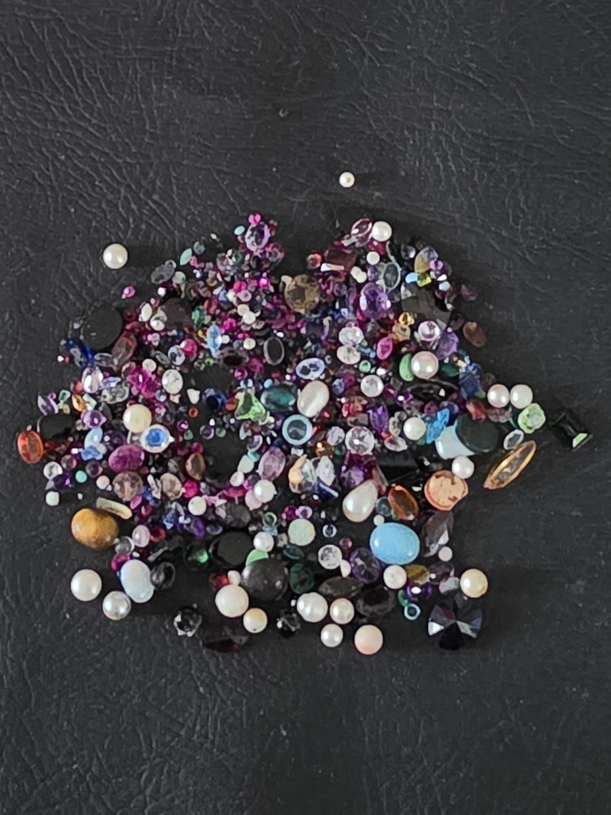 205 Ct Mixed Lot of Natural and synthetic Gemstones .