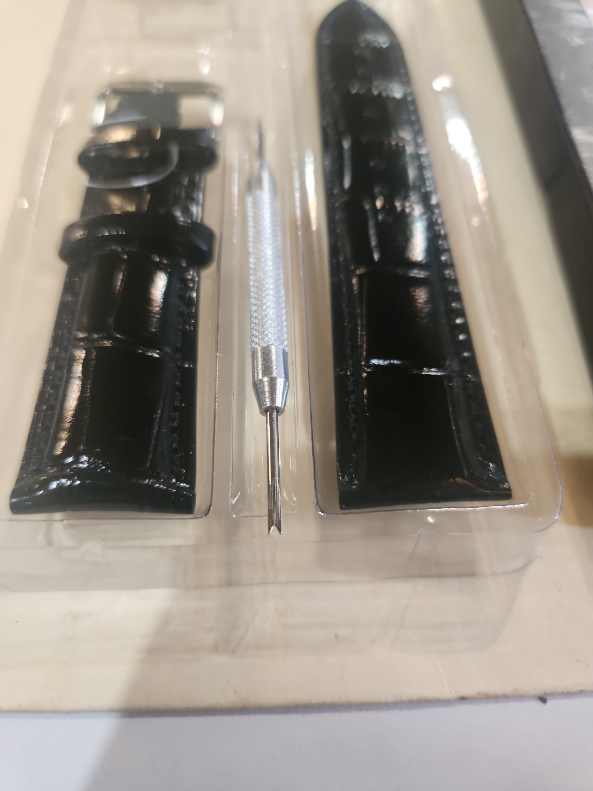 22mm black leather watch strap replacement kit that includes a spring