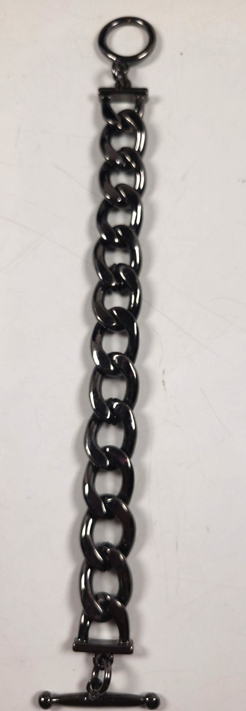 Gunmetal Toned Curb Link Bracelet with Crystal Accents.
