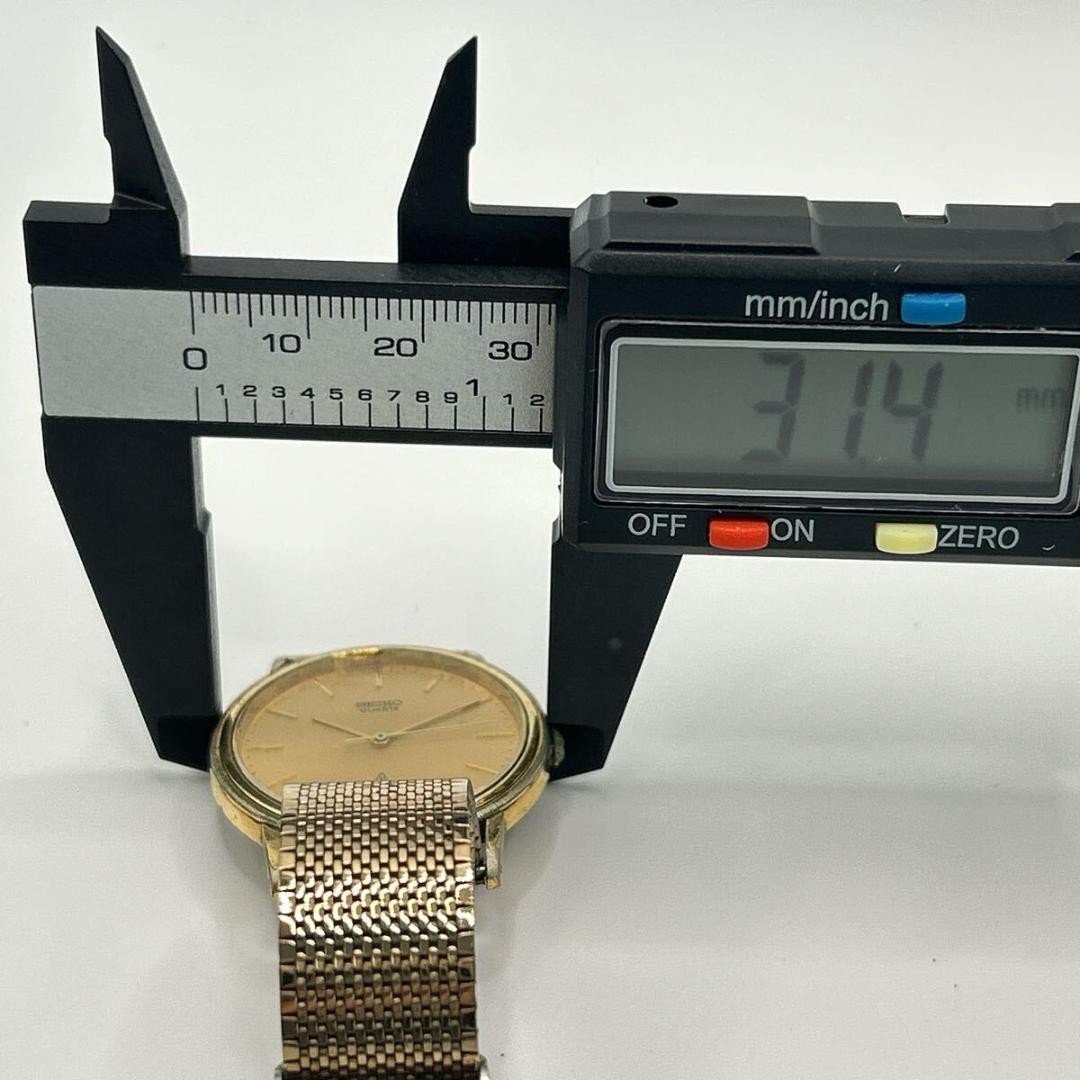 New battery, fully functional. SEIKO gold dial quartz vintage retro watch.