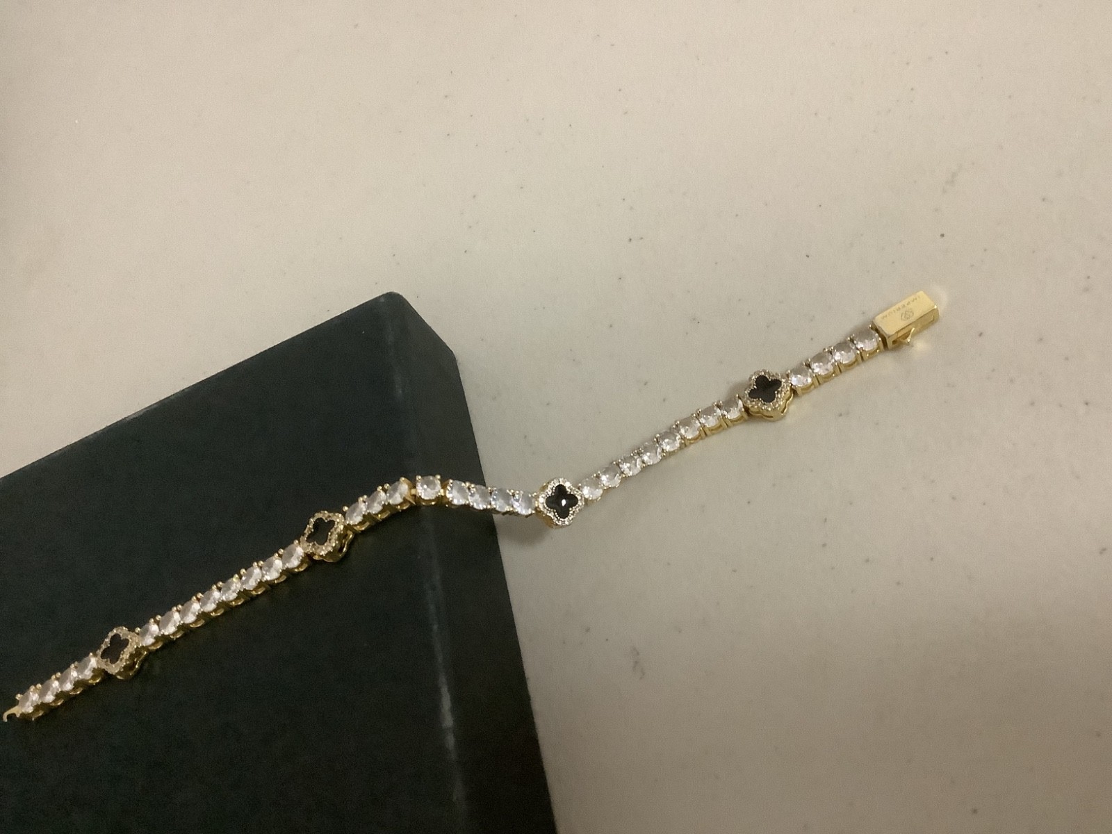 Imperium 18k gold plated CZs four leaf clover black enamel tennis bracelet 7″