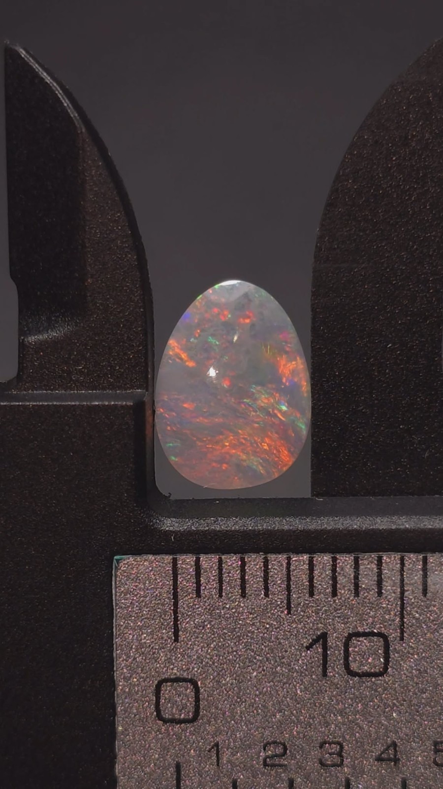 0.8cts Lightning Ridge Opal Freeform 9.4×7.1×2.2mm