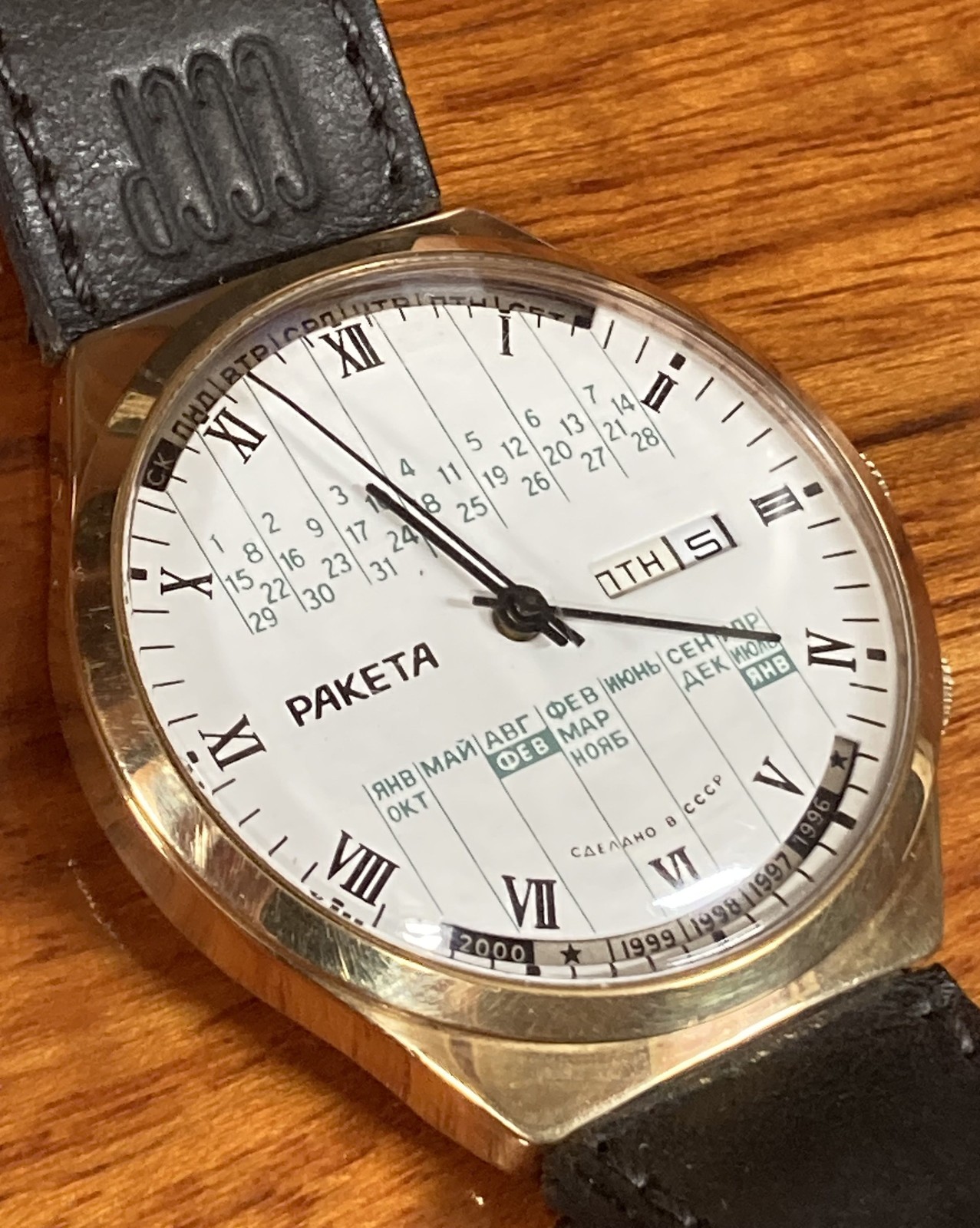 Raketa perpetual calendar watch from USSR, with leather band stamped “CCCP”
