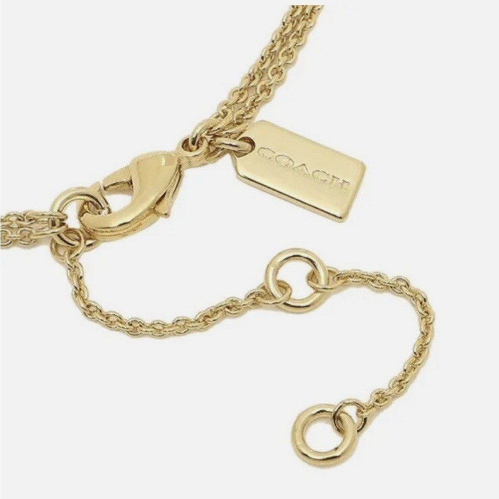 NWT Coach Gold Horse and Carriage Necklace
