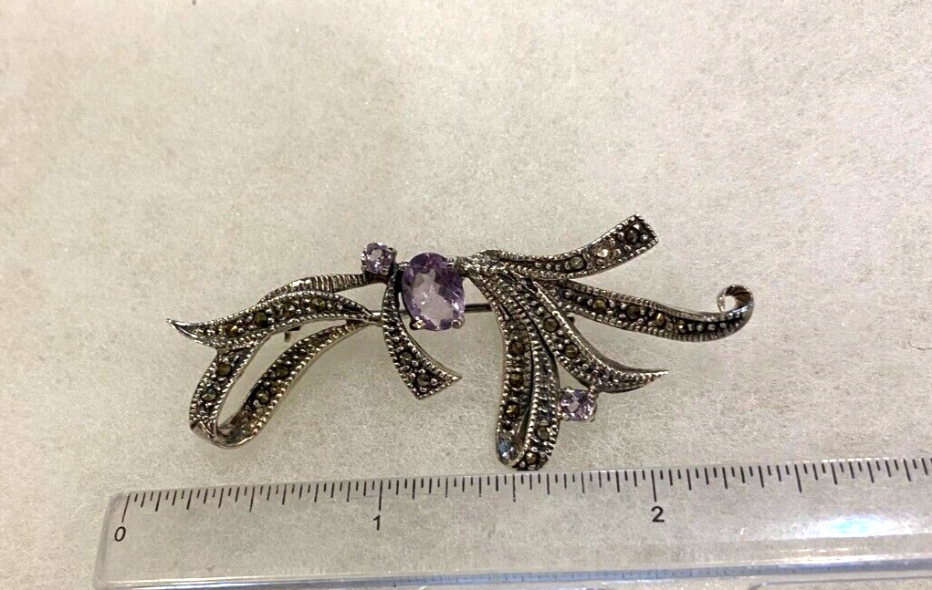 Sterling Marcasite and Amethyst Bow Pin Approx. 2 1/4 In. Wide – 9.0 Grams