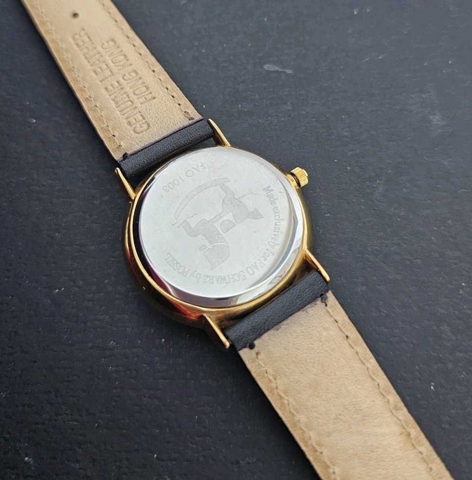 FAO Schwarz Fossil Watch Unixex Gold Black Leather Quartz 1003 Prism Face