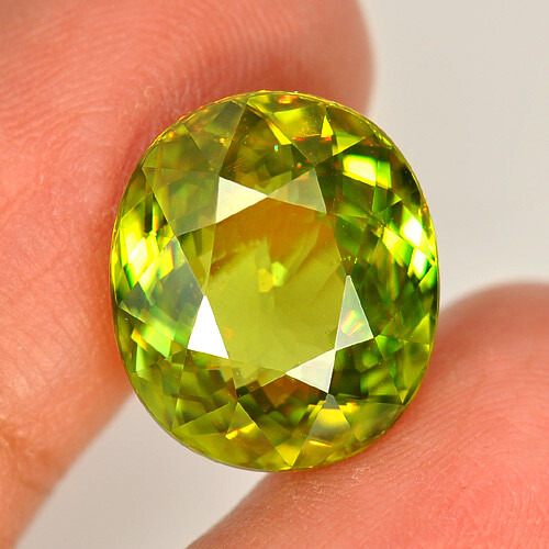 Multi Color Sphene 8.86 Ct. VVS Oval 15.2 x 13.1 Mm. Natural Unheated Gemstone