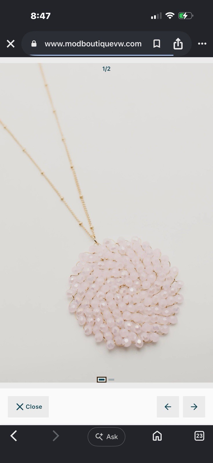light pink beaded circle pendant (necklace not included. )