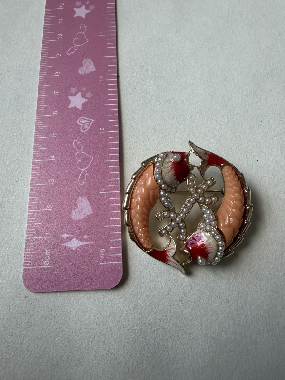 Koi fish brooch.