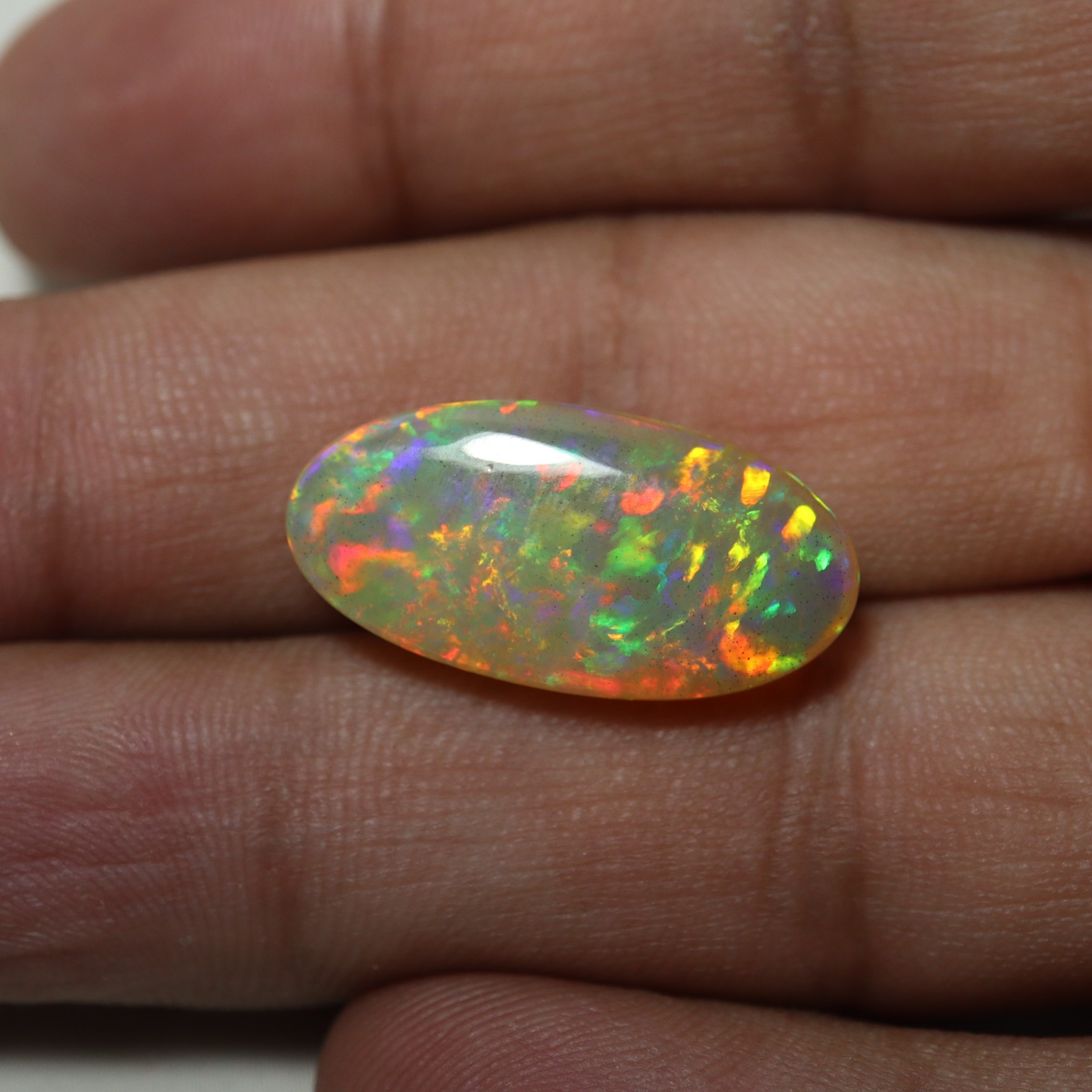 8.8Cts Natural AAA Ethiopian Opal Oval Flashy Rainbow Fire Cabochon 23.1×11.8 MM