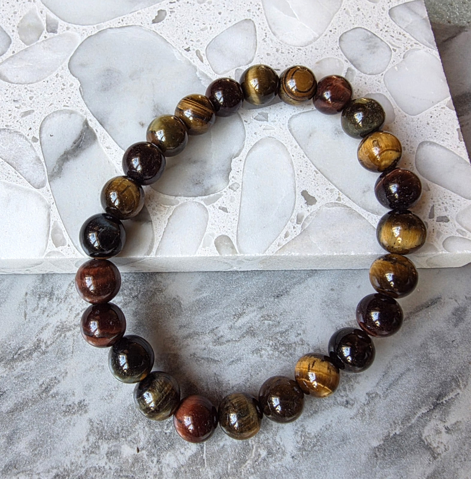 Natural Tiger’s Eye Stretch Bracelet 8-8.5mm Round, 6.50-8.00 Inches 75.0 ctw